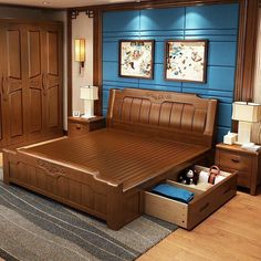 a bedroom with blue walls and wooden furniture