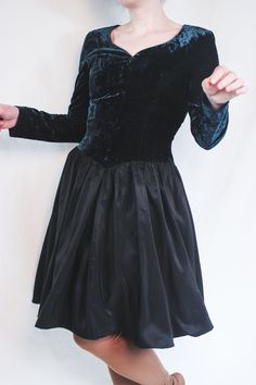 "Very beautiful vintage black taffeta and petro blue viscose velvet dress by Vera Mont. Very glossy type viscose velvet. Elegant pointed princess waist No stretch in fabric Back zipper Good vintage condition, no visible flaws. Ready to wear. ● Era : 80s/ early 90s ● Label : Vera Mont ● Fabric : 59% viscose, 41 % v cotton. Lining 100% acetate ● Size : approx M/ EU 38, fitted cut, no stretch in fabric. ● Fit : fitted upper part, no stretch, loose and very flared bottom skirt part. Zips up in the b Gothic Velvet Dress For Winter, Gothic Velvet Dress For Fall, Velvet Dresses For Winter Costume Party, Fitted Vintage Dress For Fall Costume Party, Winter Velvet Costume Party Dresses, Vintage Dress For Fall Costume Party, Fitted Velvet Dress For Costume, Fitted Velvet Dress For Costume Events, Fitted Velvet Dress For Costumes