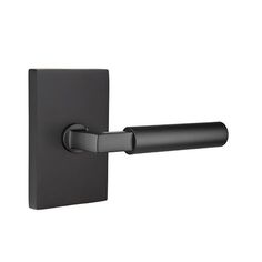 an image of a black door handle on a white background