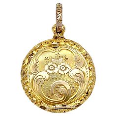 This finely chiselled and engraved Georgian 15 karat gold locket pendant holds a beautiful hair arrangement under glass in the shape of feathers. The two colour hair locks are held together by gold wire. Two Colour Hair, Two Color Hair, Colour Hair, Hair Locks, Gold Locket, Pocket Watches, Amulets, Gold Wire, Flowers In Hair