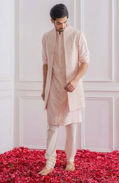 Editor's Note Featuring A Contemporary Front Open Lucknowi Powder Pink Nehru Jacket With Delicate Thread And Sequence Embroidery. Perfect For The Mehndi/haldi Occasion. This Comes With A Powder Pink Panelled Kurta. Color: Pink Fabric: Pure Georgette & Cotton Silk Care: Dry Clean Only About the Designer Ankit V Kapoor is a clothing brand that amalgamates traditional Indian handicrafts and bespoke tailoring. Inspired by the heritage of India and unified with revolutionary thoughts. Specialize in M Men Outfit For Sisters Wedding Indian, Lucknowi Mens Kurta, Brother Dress For Sister Wedding, Lucknowi Kurta For Men Wedding, Lucknowi Kurta For Men, Nehru Jacket With Kurta, Traditional Indian Mens Clothing, Brother Wedding