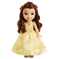 the doll is wearing a yellow dress and has brown hair, she's smiling at the camera