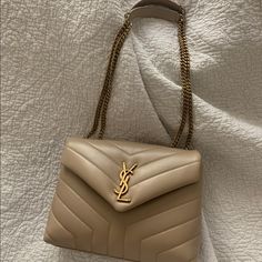 Ysl Lou Lou Size Small In The Color Dark Beige. Great Condition Smoke-Free Home! Never Really Used His Bag Always In Box. Comes With Box, Dust Bag And Receipt! Small Bag Outfit, Ysl Belt Bag, Ysl Kate Bag, Hobo Bag Outfit, Ysl Tote Bag, Bags Ysl, Nude Bags, Saint Laurent Purse, Ysl Belt