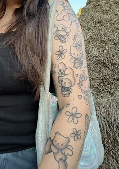 a woman with a tattoo on her arm