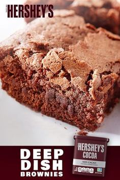 a close up of a piece of brownie on a plate with a bar of hershey's chocolate