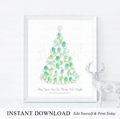 a watercolor christmas tree with green leaves on it