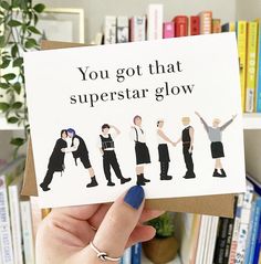 A picture of a greeting card that says "You got that Superstar Glow" and a drawing of the BTS members spelling out ARMY with their bodies. Butter Bts, Sticker Product, Bts Butter, Product Photos, Bts Army, Bangtan Boys, Greeting Card, Greeting Cards, Butter