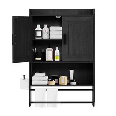 a black cabinet with white towels and other bathroom items on it's shelf, against a white background