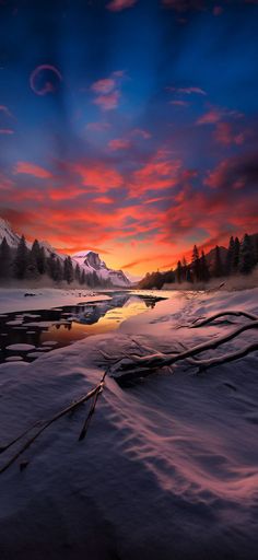 the sun is setting over a snowy mountain lake