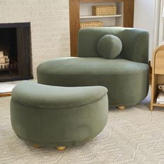 a green chair and ottoman in a living room