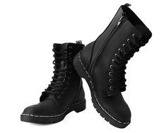 Lace up for action and start a riot in these rad combat boots. Features a vegan friendly, black faux leather upper with 10-eye lace-up detail. Has a 1” heel, removable memory foam padding for added comfort, and inside zipper closure for easy on/off. Techno Clothes, Creeper Boots, Combat Boots Style, Lug Sole Boots, Shoes Outlet, Fancy Outfits, Shoe Store, Lace Boots, Black Faux Leather