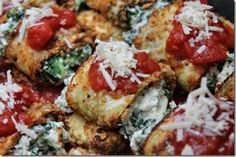 a close up of a plate of food with broccoli and tomatoes on it