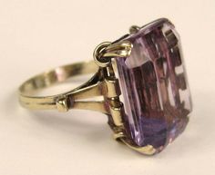 For Sale on 1stDibs - Stunning large Emerald Cut Amethyst Cocktail ring. Wonderful 14K Gold Setting on this ring. The Ring is a size 5-1/4 and can be sized by us or your jeweler, Antique Amethyst Ring With Prong Setting For Formal Events, Estate Style Formal Rings With Gemstones, Antique Amethyst Ring With Prong Setting For Formal Occasions, Vintage Amethyst Ring, Art Deco Amethyst Ring With 17 Jewels, Antique Amethyst Ring With Prong Setting, Gold Art Deco Amethyst Ring Collectible, Collectible Amethyst Art Deco Rings, Collectible Art Deco Amethyst Rings