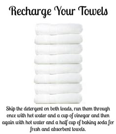 a stack of white towels with the words recharge your towels