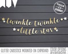 the twinkle twinkle little star banner is hanging from a string