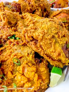 fried food is served on a white plate