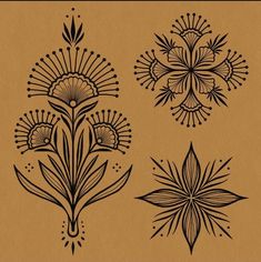 four flower designs on brown paper with black ink and some white ink in the middle