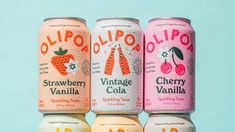 four different flavors of strawberry vanilla, cherry cola and oldipo sodas are stacked on top of each other