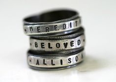 Personalize this sterling silver custom band ring. Your child's name, your sweetie's nickname, or your favorite saying stamped on a silver stacking band ring. This simple ring has been oxidized to look rustic, yet modern. They look great stacked but we suggest that you wear only two at a time, unless you have giant fingers!This listing is for one ring, which measures 3/16" high. The typeface used will be the same as pictured. Please see our policies page for the turn around time on orders here.. Adjustable Engraved Sterling Silver Stackable Rings, Meaningful Engraved Adjustable Stackable Rings, Adjustable Stamped Stackable Rings For Everyday, Meaningful Engraved Silver Stackable Rings, Personalized Name Sterling Silver Stackable Rings, Silver Hand-stamped Engraved Ring, Meaningful Engraved Sterling Silver Stackable Ring, Adjustable Stamped Engraved Ring With Round Band, Meaningful Stackable Engraved Sterling Silver Ring