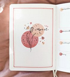 an open notebook with writing on it and flowers in the pages next to each other