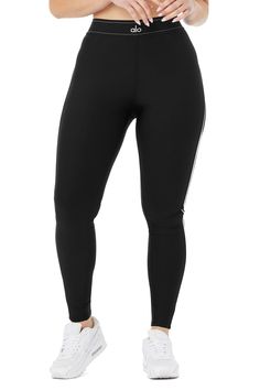 A chic alternative to basic black leggings, the Suit Ups have a boxer-style waistband and body-contouring piping that flatters in all the right places. And they’re made from Airlift—our best-selling high-compression fabric that lifts, sculpts, and stands out with a subtle shine. As for the fit, they reach extra high on the waist with full-length legs. Don’t forget the matching bra to complete the set. Black Compression Leggings By Alo Yoga, Black High Stretch Alo Yoga Leggings, High Stretch Black Alo Yoga Leggings, Alo Yoga High Stretch Black Leggings, Black Compressive Alo Yoga Leggings, Alo Yoga Sporty Tight Leggings, Alo Yoga Tight Sporty Leggings, Tight Sporty Alo Yoga Leggings, Alo Yoga Black Leggings For Workout