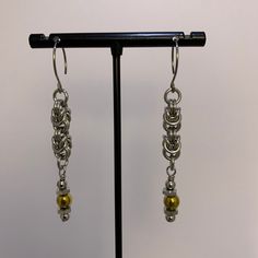 These gorgeous and unusual chainmail earrings are made with quality stainless steel rings. The rings are individually woven together into Byzantine weave chain  drops with created hematite bead or stainless steel bead features. They dangle from either hoop, hook or kidney hook shape stainless steel ear wires. These earrings feature slightly different Byzantine chain weaves, beads and ear wires: Pink/Gold Hematite teardrop beads - size graduated Byzantine units - hook style ear wires - drop 5cm | Silver Byzantine Pierced Earrings, Gift Drop Earrings With Hooks And Links, Metal Earrings With Box Chain For Gift, Metal Earrings With Hook And Links For Gifts, Chainmail Earrings, Byzantine Chain, Rosa Gold, Woven Chain, Teardrop Beads