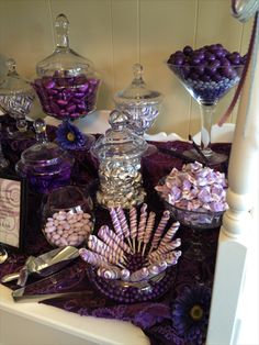 a table topped with lots of candy and candies