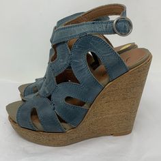 Heel Measures 4.5 Inches New Without Tags See Last Photo Irregular Sole Blue Synthetic Wedge Sandals With Heel Strap, Blue Leather Wedge Sandals For Spring, Blue Leather Wedge Heel Sandals, Blue Leather Wedge Sandals With Round Toe, Blue Leather Wedge Sandals With Ankle Strap, Blue Wedge Sandals With Stacked Heel, Casual Blue Wedge Sandals With Open Heel, Blue Open Toe Wedge Sandals With Heel Loop, Lucky Brand Shoes