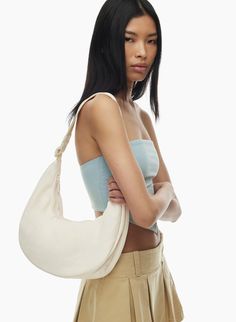 PHOEBE BAG | Aritzia Everyday Nylon Hobo Crossbody Bag, Everyday Nylon Crossbody Hobo Bag, Nylon Crossbody Hobo Bag With Zipper Closure, Modern Softback Shoulder Bag With Adjustable Strap, Trendy Nylon Hobo Bag With Adjustable Strap, Modern Shoulder Bag With Adjustable Strap, Versatile Softback Shoulder Bag With Detachable Strap, Trendy Nylon Hobo Crossbody Bag, Everyday Nylon Shoulder Bag With Adjustable Straps