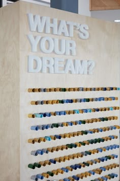 a wooden sign that says what's your dream?