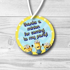 a round hanging ornament with the words thanks minions for coming to my party