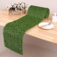 the table is covered with green grass