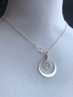 Note: ONLY 1 available. (Retiring Design) This beautiful sterling silver "Om" necklace features a 1 pt. genuine diamond stone. "Om" is the sacred vibration of creation and in many religions and cultures, is believed to be the most sacred and spiritual mantra. In Hebrew, the word "Anaya" means guardian. Features: - Handcrafted from the finest .925 Sterling Silver Andrina Collection Available lengths: 16", 18” lengths Hook & eye front closure Gift suggestion CLICK to VIEW video. Om Necklace Silver, Om Necklace, Gift Suggestions, View Video, Only 1, Diamond Stone, Mantra, Silver Necklace, Thing 1