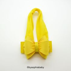 "YELLOW BABY BOW HEADBAND --->> MANY COLORS AVAILABLE <<--- Please see link: https://www.etsy.com/shop/BySophiaBaby?ref=seller-platform-mcnav&search_query=1699 --->> FREE SHIPPING <<-- When you spend $50 in our shop, please see code on our shop announcement. *BOW HEADBAND DESCRIPTION*: - Unique Handcraft Triple Bow placed on a 1.5\" stretchy Headband. Bow measure approx. 2.5\"X 2.0\" - Bow is made of fabric and grosgrain, it's very light & headband holds very well Adjustable Yellow Headband For Gift, Adjustable Yellow Headband As Gift, Adjustable Yellow Headband Gift, Baby Hair Bow, Yellow Bow, Headband Bow, Yellow Baby, Baby Bow Headband, Baby Flower