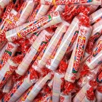 a pile of candy sticks sitting on top of each other