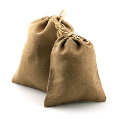 two burlock bags with string handles on white background