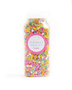 sprinkle medley jar filled with colorful sprinkles on a white background