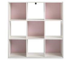 a white book shelf with pink shelves on each side and two black hooks hanging from the top