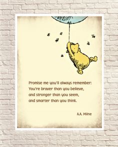 winnie the pooh quote on a brick wall with an image of a balloon floating above it