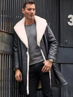 Men's Double Sided Shearling Leather Coat In Matte Black Outer Shell: Real Leather Leather Type: Sheepskin Leather Finish: Semi-aniline Inner Shell: Faux Shearling Feature: Double-Sided With Big Elegant Fur Collar Closure Style: Wrap Belted Collar Style: Oversized Cuffs Style: Open Hem Inside Pockets: Two Outside Pockets: Two Side Pockets Color: Matte Black Black Sheepskin Fur Coat With Faux Fur Lining, Black Sheepskin Leather Jacket With Faux Fur Trim, Black Sheepskin Long Coat, Black Shearling Fur Coat For Fall, Black Leather Fur Coat With Faux Fur Trim, Classic Black Fur Coat With Faux Fur Lining, Leather Fur Coat With Long Sleeves For Cold Weather, Leather Fur Coat For Cold Weather With Long Sleeves, Leather Fur Coat For Cold Weather