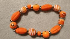 Orange and White Stretch Bracelet with Silver Tone Accents Stretch Bracelet, Stretch Bracelets, Silver Tone, Beaded Bracelets, Handmade Gift, Bracelet, Orange