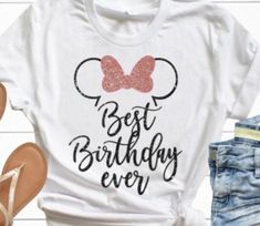 a minnie mouse shirt with the words best birthday ever on it and a pair of jeans