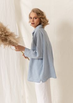 "Linen blouse is perfect for a sustainable and ethical lifestyle. Pure washed linen collection has a special stone wash finishing. Our blouse is made from OEKO- TEX Standard 100 Certified linen fabric. The fabric feels soft yet is very strong and long-lasting. #DETAILS -Oversized button- down blouse; -Color: sky blue; -Long sleeves; -Made from 100% European flax; -Our model wears size S and is 177 cm./5,8 ft. tall. #SIZE CHART We recommend choosing to check garment measurements before selecting Long Sleeve Washed Blouse With Relaxed Fit, Washed Long Sleeve Blouse With Relaxed Fit, Long Sleeve Washed Relaxed Fit Blouse, Washed Blue Long Sleeve Linen Top, Washed Long Sleeve Relaxed Fit Blouse, Blue Linen Blouse For Spring, Spring Blue Linen Blouse, Light Wash Relaxed Fit Long Sleeve Blouse, Flax Cotton Relaxed Fit Blouse