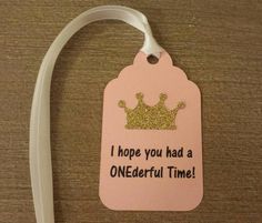 a tag that says i hope you had a onederful time with a crown on it