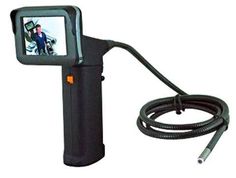 an image of a video camera attached to a tripod with a hose connected to it