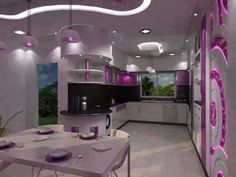 a modern kitchen with purple accents and white walls, along with an oval dining table set for four