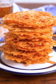 a stack of fried food sitting on top of a white plate