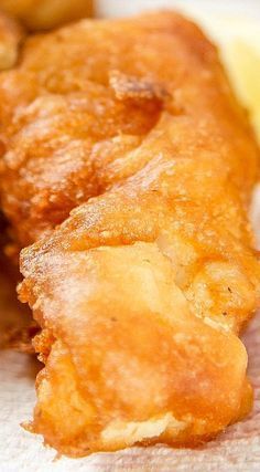 some fried food is sitting on a napkin