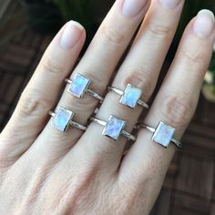 "A simple stackable rectangle-shaped smooth(cabochon)Rainbow Moonstone bezel set on a sterling silver ring, which makes a great birthstone ring for those June Birthdays or a lovely midi/pinky/knuckle ring for her! This also makes an ideal ring to stack with our other gemstone rings. BELESAS and 925 hallmarked inside the ring. Wrapped in a box ready for gift giving.(r-496) Listing is for 1 Ring Ring info -------------------------- Rainbow Moonstone measure 6.5mm x 8.5mm Model is wearing a size 5 Minimalist Silver Rings With Rectangular Stone, Minimalist Jewelry With Rectangular Birthstone, Minimalist Rectangular Birthstone Jewelry, Minimalist Silver Jewelry With Rectangular Stone, Modern Stackable Moonstone Ring For Gift, Modern Stackable Moonstone Ring Gift, Adjustable Minimalist Jewelry With Rectangular Stone, Rectangular Moonstone Ring For Anniversary, Sterling Silver Stackable Rectangular Jewelry