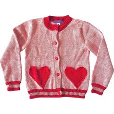 a red and white knitted cardigan with hearts on the front, sitting against a white background